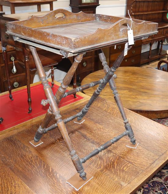 An early 19th century oak butlers tray on turned stand (a.f.) W.68cm